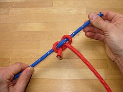 Kreuzknoten �ffnen, 2. Schritt