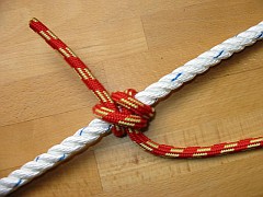 Stopperstek, an einer Leine angesteckt